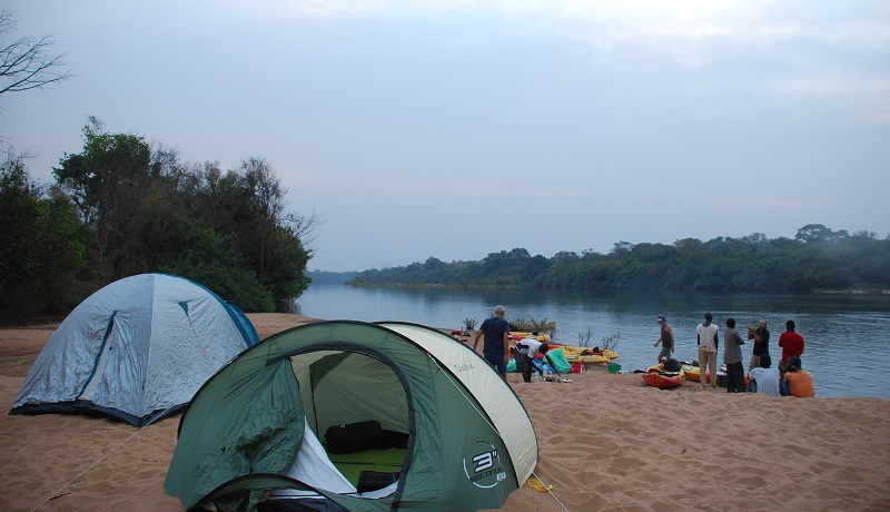 camp on the riverbank of corubal